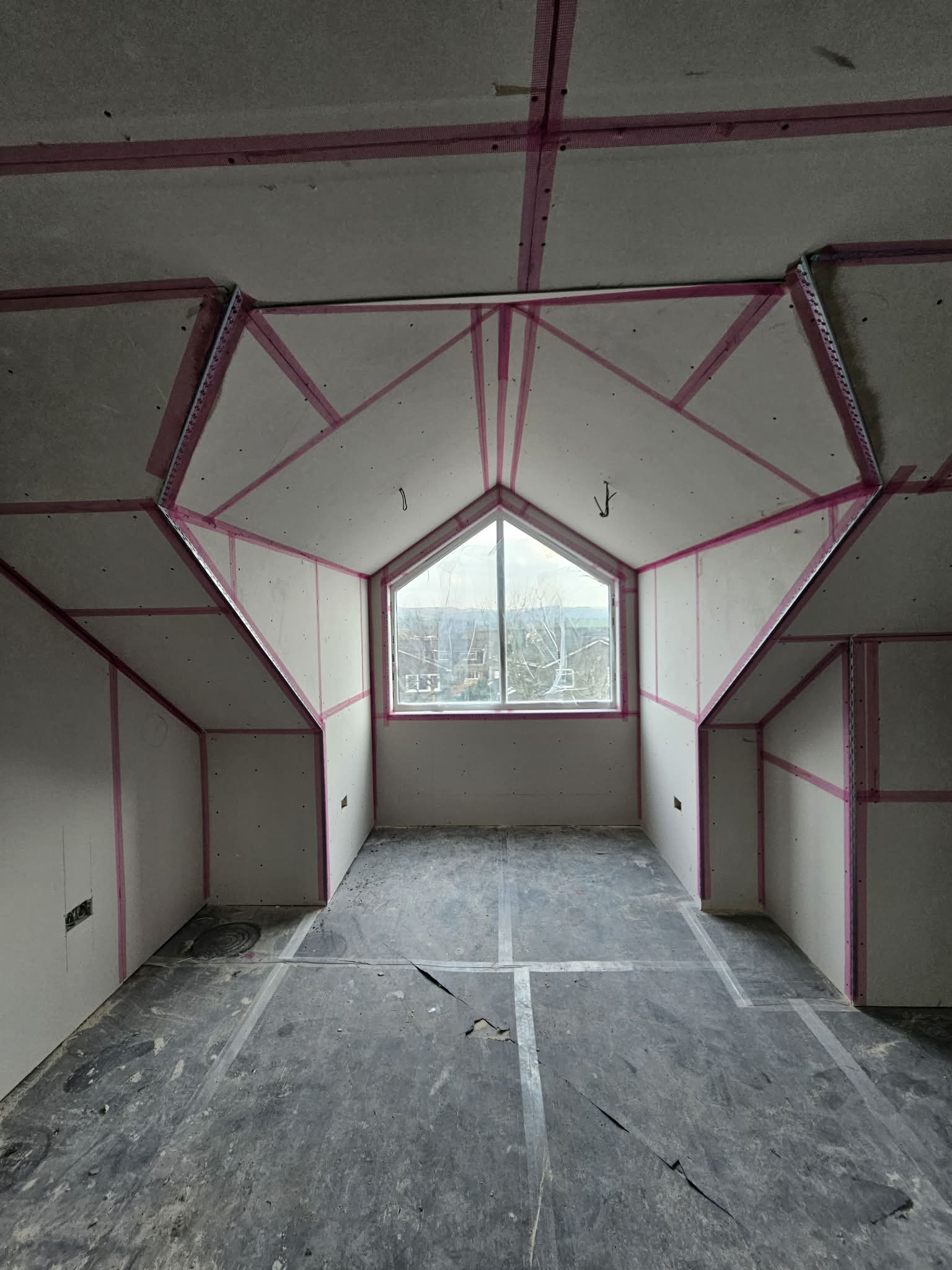 Loft room after detailed boarding and before plastering