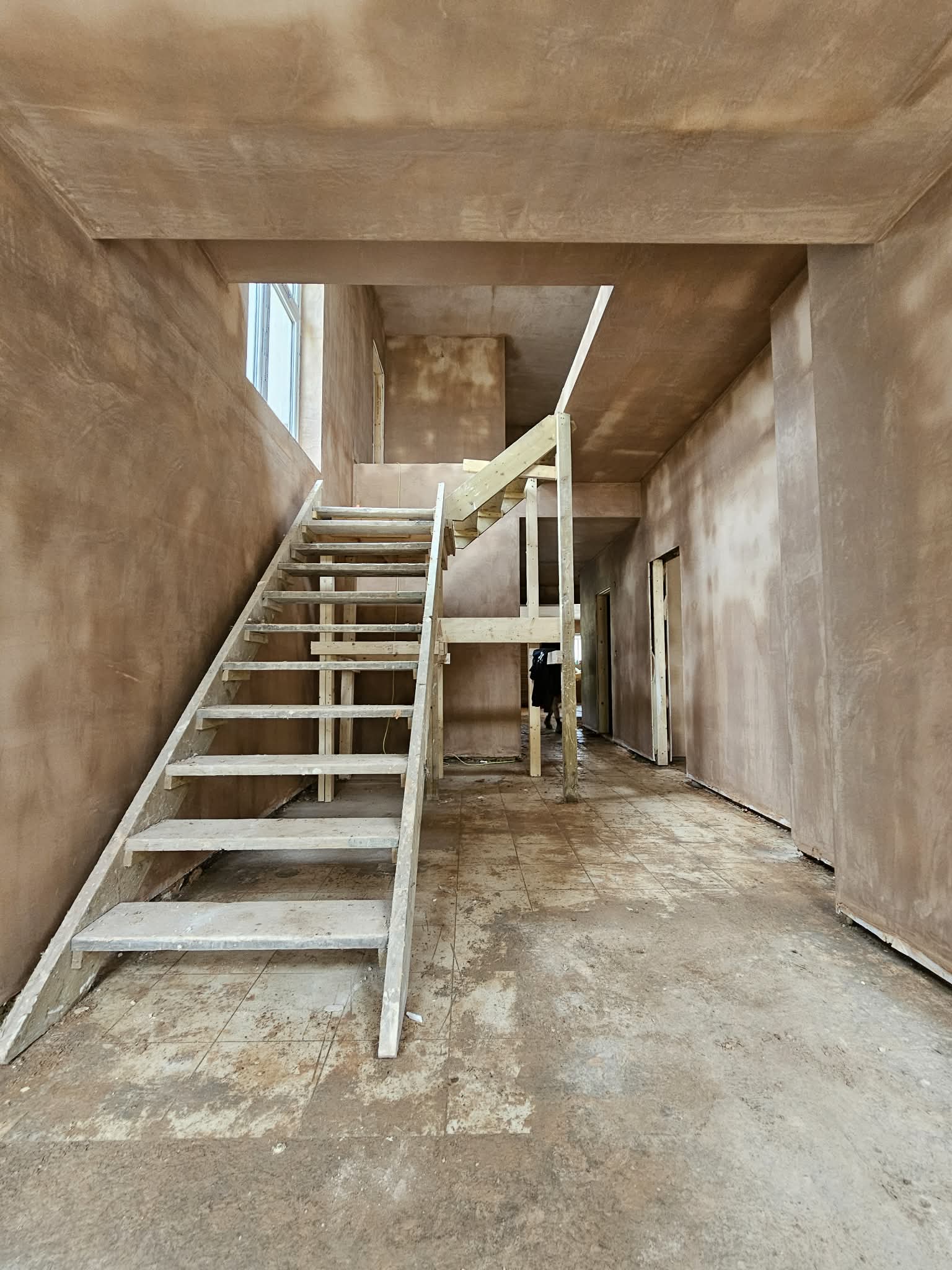 Freshly plastered staircase and landing